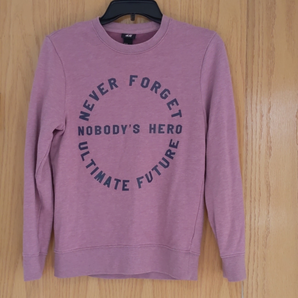 Rarely warn pink sweater